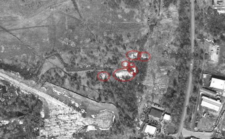 A satellite image showing white spots right where the crash was supposed to be, five days before it happened